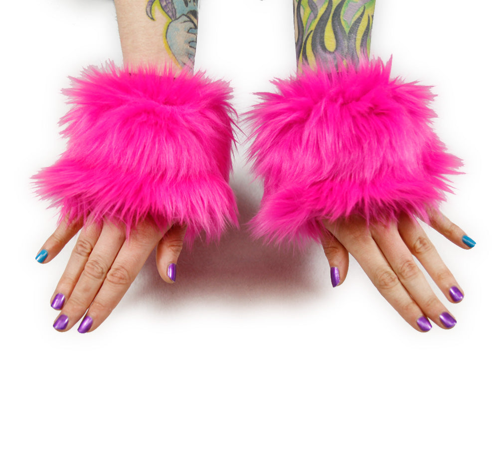 neon hot pink Monster Fur Fluffy Cuffs by Pawstar! Furry wrist cuffs made from faux fur for raves, cosplays, halloween, music festivals, and more.