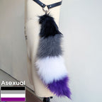 Pawstar branded gay pride keychain furry tail in the asexual ace flag.