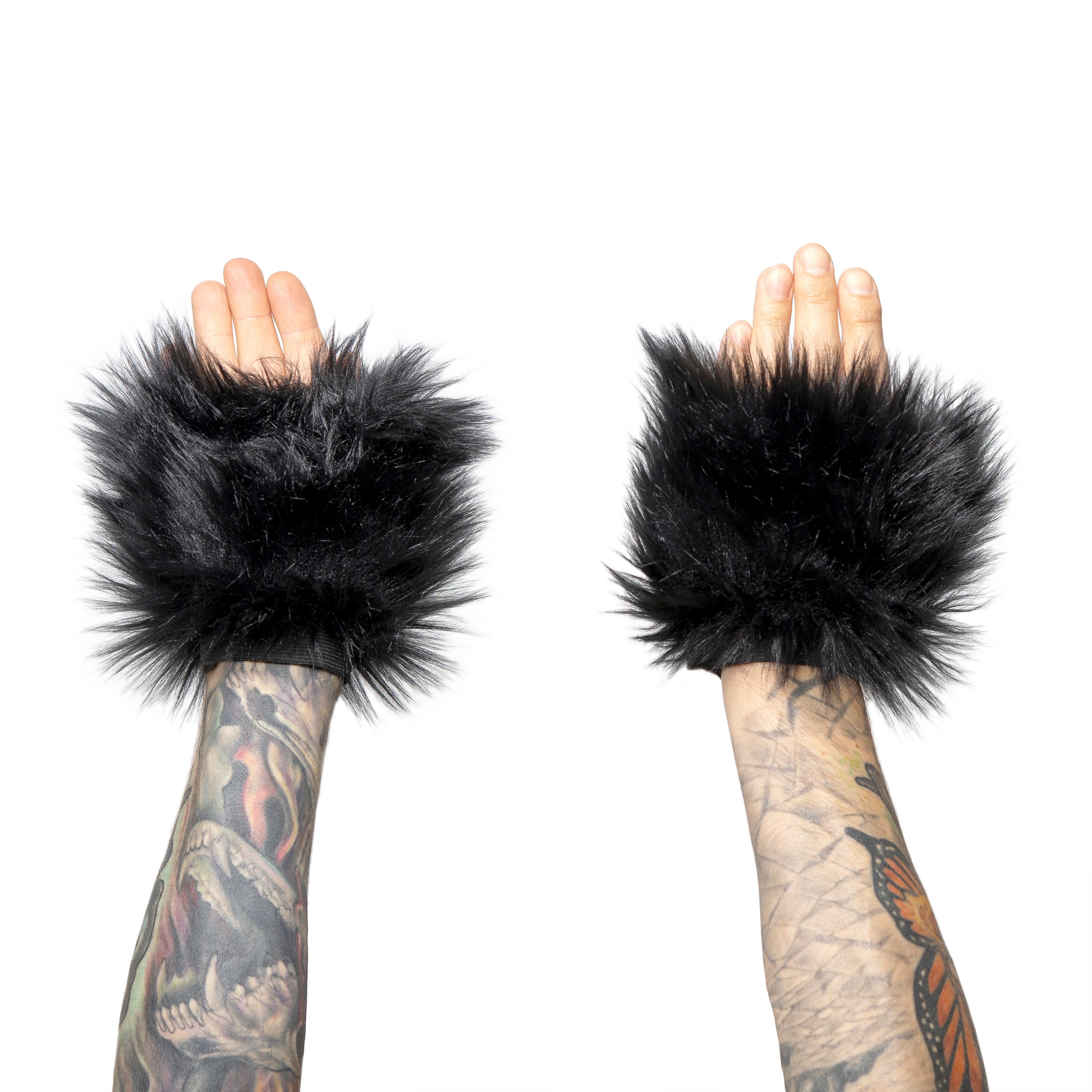 black Monster Fur Fluffy Cuffs by Pawstar! Furry wrist cuffs made from faux fur for raves, cosplays, halloween, music festivals, and more.