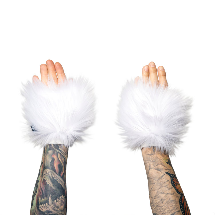 white Monster Fur Fluffy Cuffs by Pawstar! Furry wrist cuffs made from faux fur for raves, cosplays, halloween, music festivals, and more.