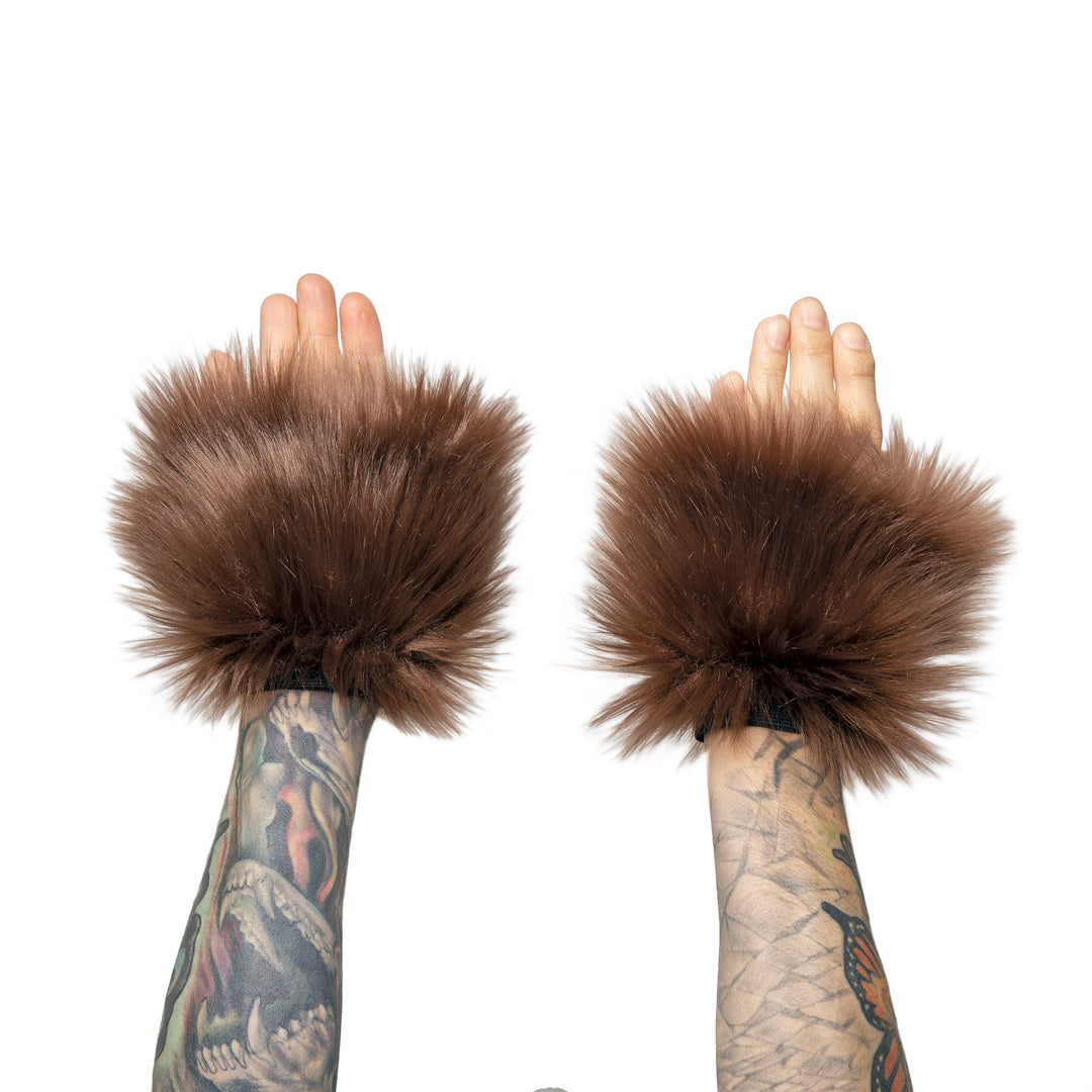 brown Monster Fur Fluffy Cuffs by Pawstar! Furry wrist cuffs made from faux fur for raves, cosplays, halloween, music festivals, and more.