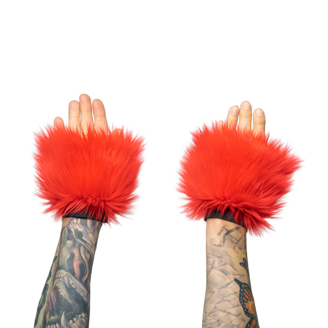 red Monster Fur Fluffy Cuffs by Pawstar! Furry wrist cuffs made from faux fur for raves, cosplays, halloween, music festivals, and more.