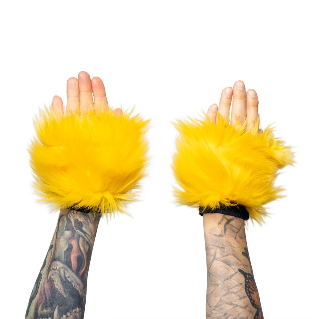 yellow Monster Fur Fluffy Cuffs by Pawstar! Furry wrist cuffs made from faux fur for raves, cosplays, halloween, music festivals, and more.