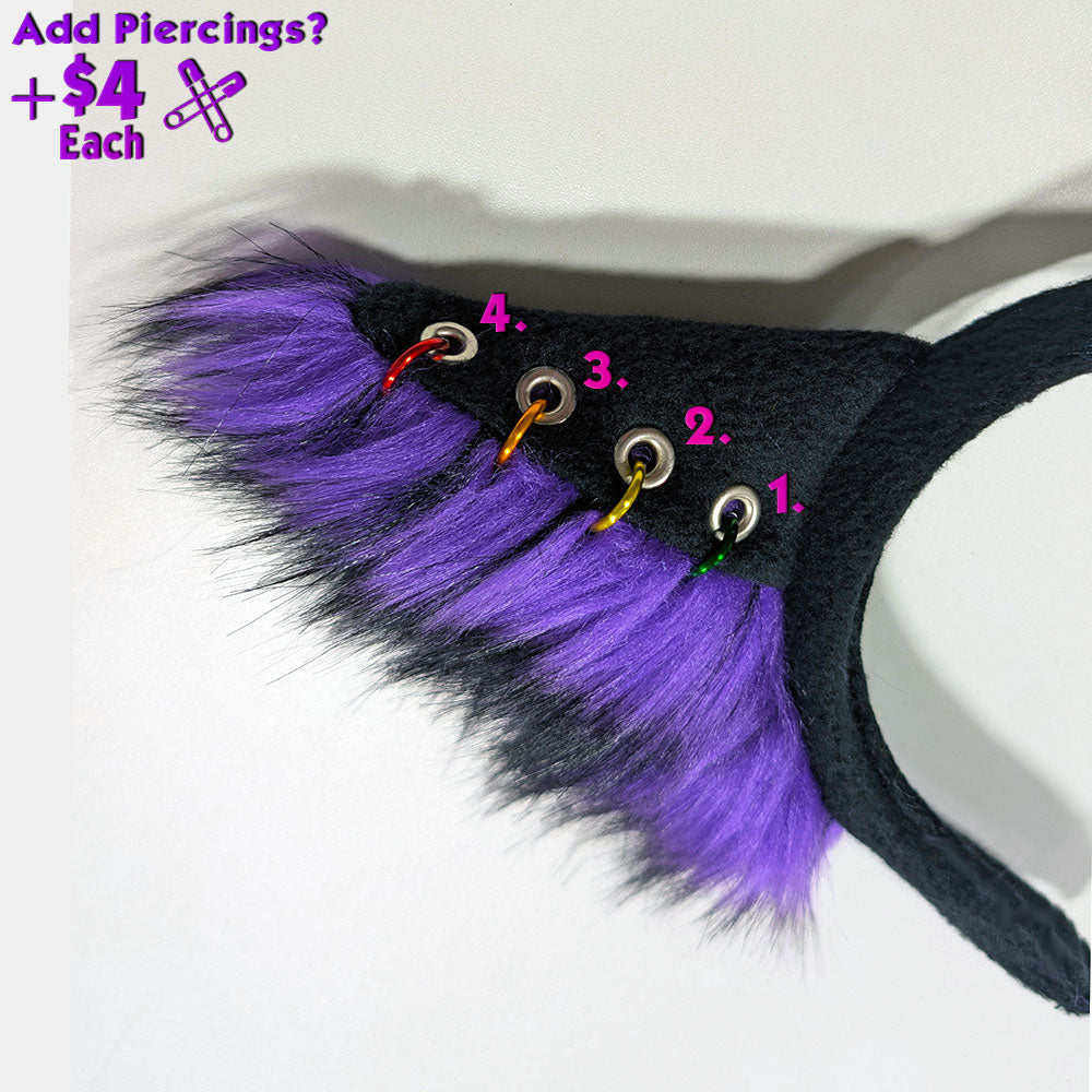 Black headband with purple fur and eye-shaped piercings on a white background