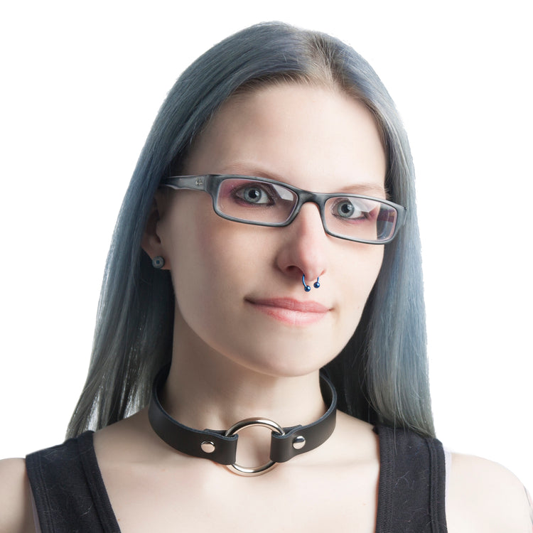 female model wearing black basic dreamy collar. Pawstar leather choker for furry conventions, halloween, cosplay and alt fashion. Made in America since 2003.