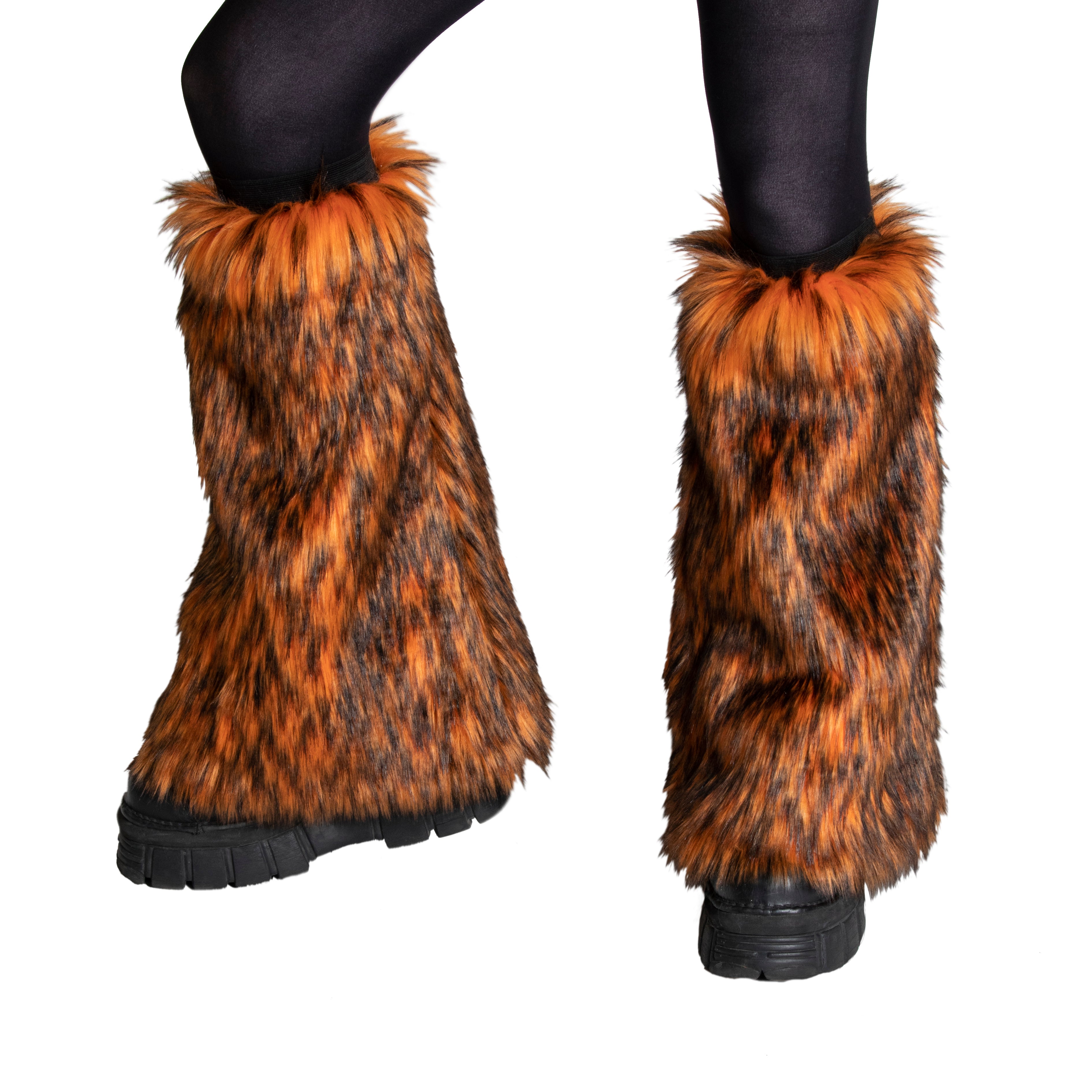 orange Pawstar fluffy leg warmers for danceers, ravers, furries and music festival goers. 