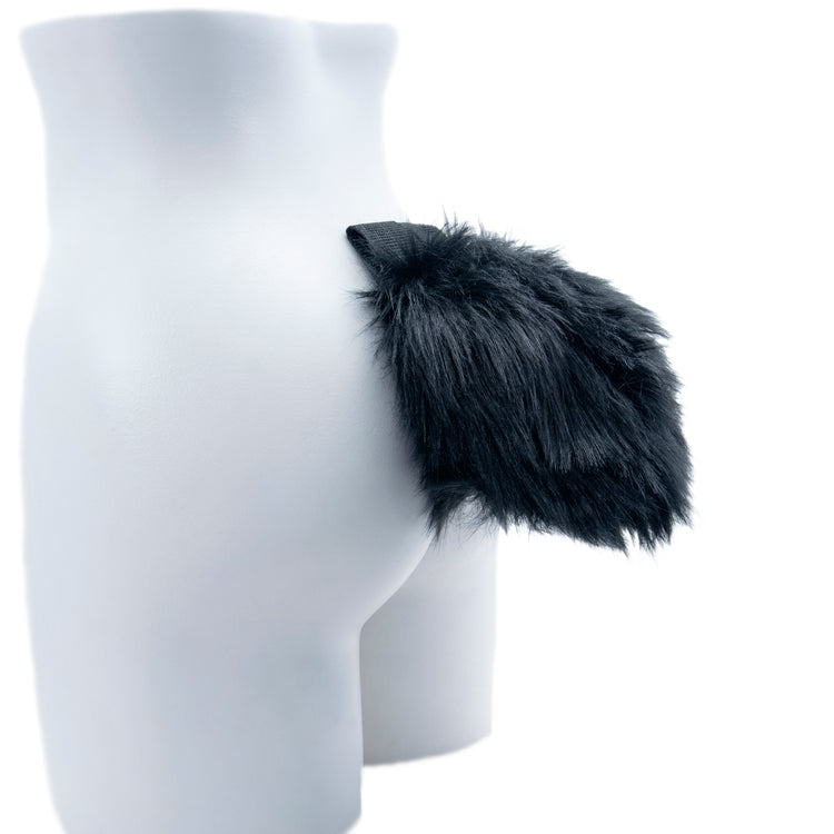 black Pawstar faux fur bunny rabbit tail. Perfect for Halloween costumes, cosplay, fursuits and more. Made in the usa